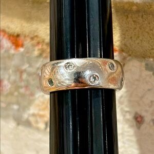Silver (sw 925) Ring with CZ (faux) diamonds.